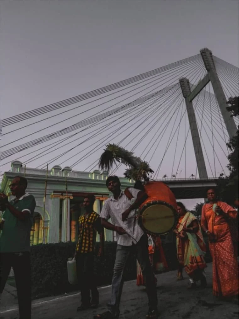 Kolkata's Durga Puja. It was the last day of the festival and they were coming after giving 'Bhasan'.